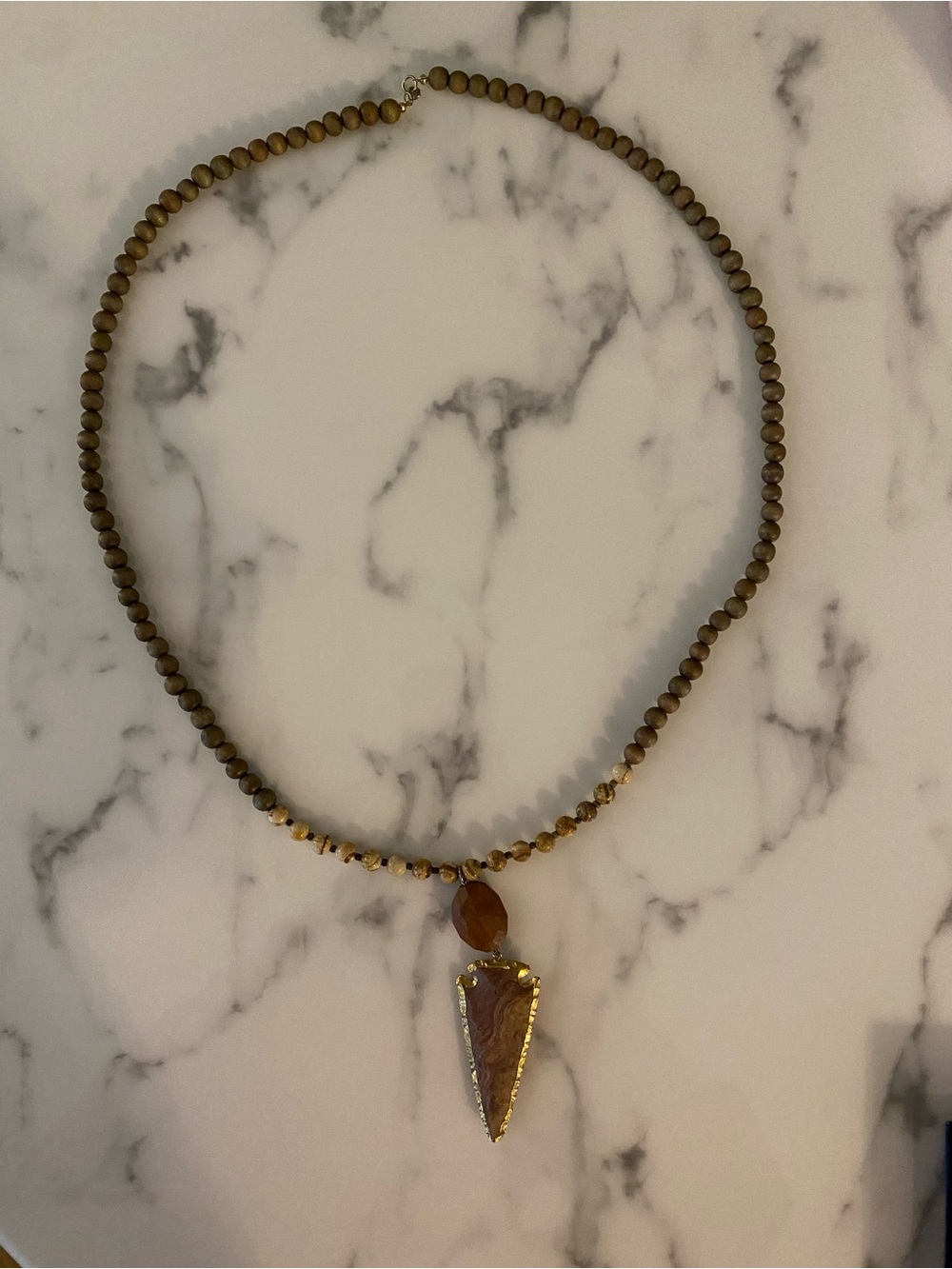 Brown Beaded Arrowhead Pendant Necklace with Gold Accents